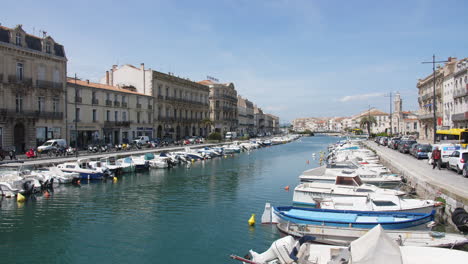 Sete-France-view-of-the-canal-with-docked-boats-residential-area-Herault